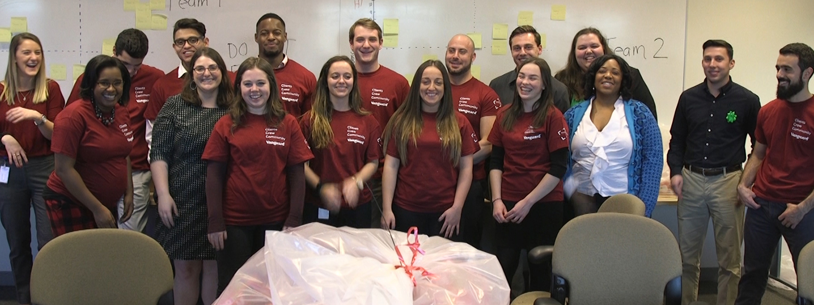 BlogBanner_VGGivingSeason_1600x600 employees wrapping gifts