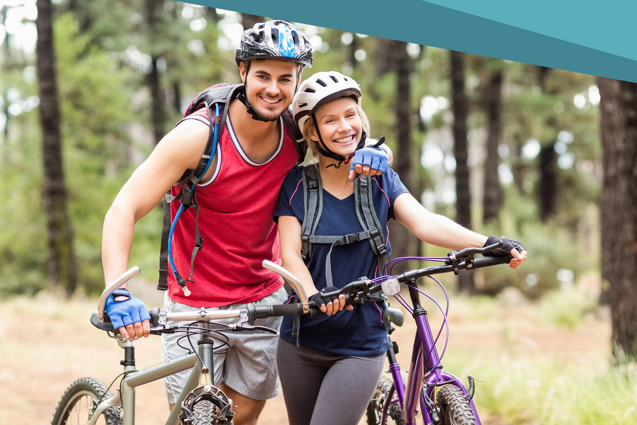 shutterstock_310694090-20200508-about Happy young biker couple looking at camera in the nature