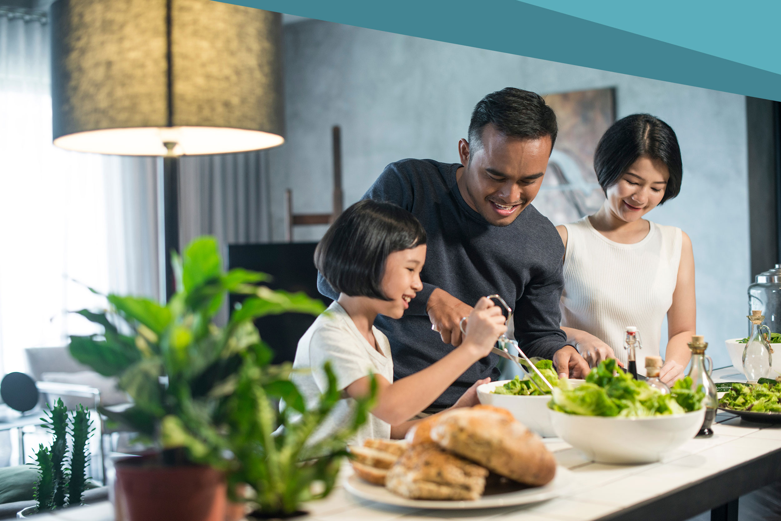 shutterstock_1010484394-about Happy family preparing food in the kitchen.