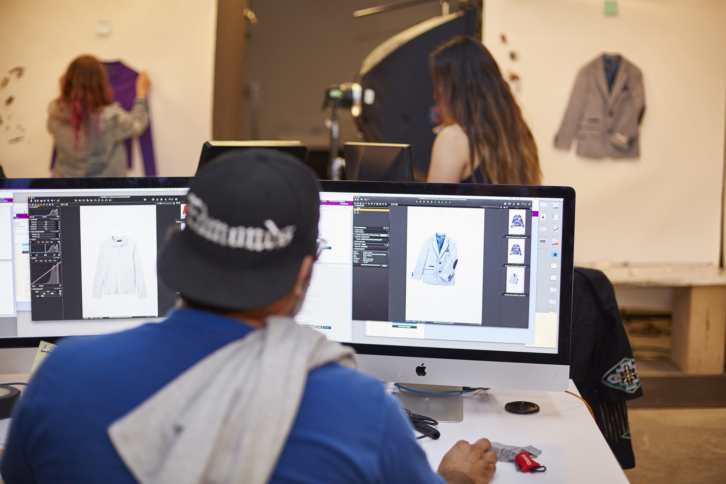 Zulily Team Member reviewing product photography in-studio.