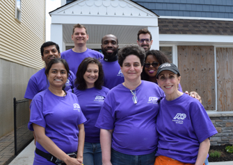ADP volunteers wearing their signature purple t-shirts