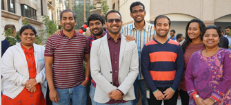 Diverse group of ADP employees at work