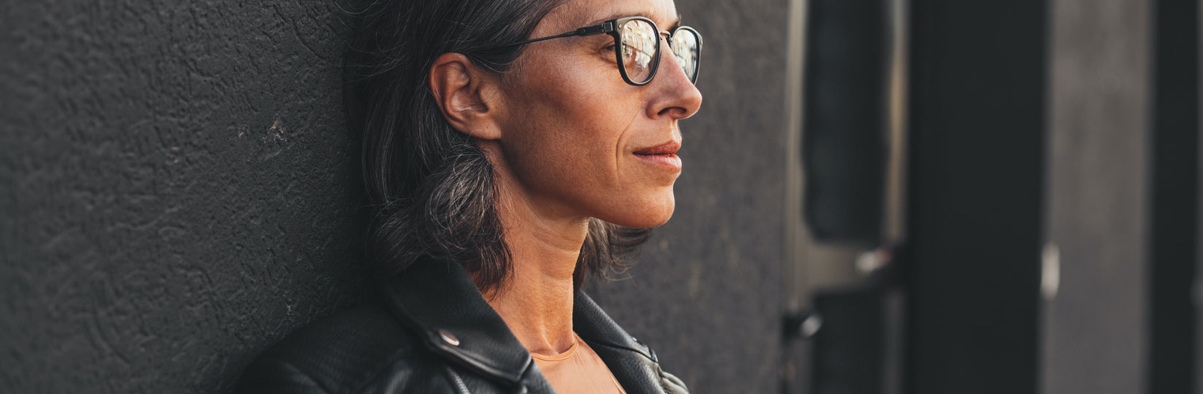 Woman smiling while looking off camera