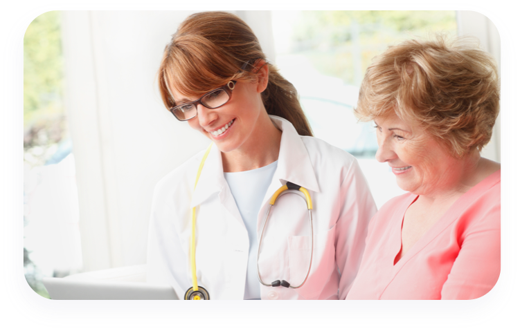 Female physician consulting with older female patient.
