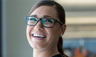 empowered-leaders Headshot of woman in glasses.