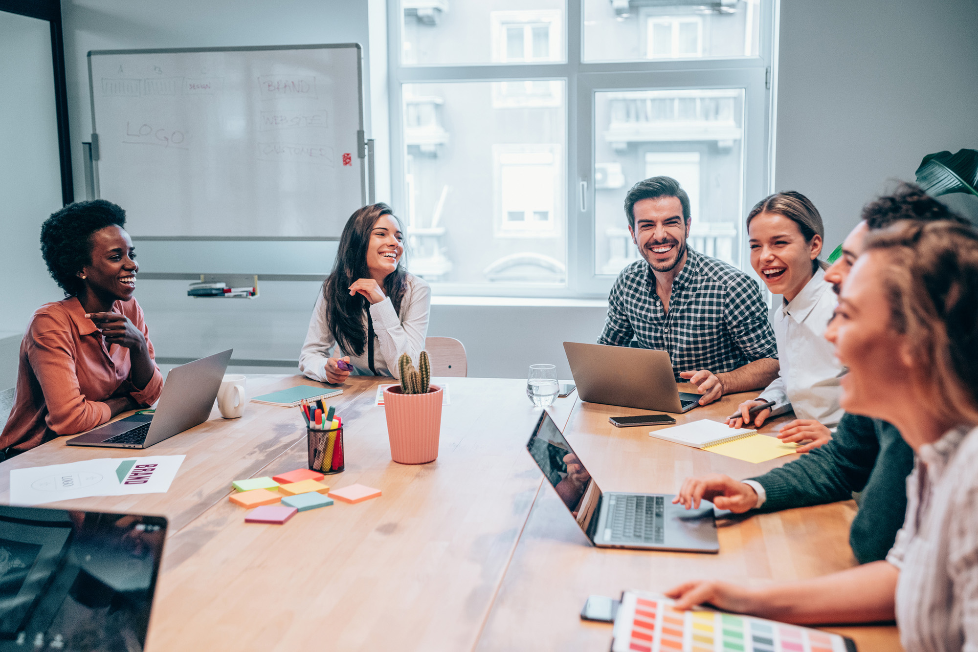 Young business people on meeting in board room.