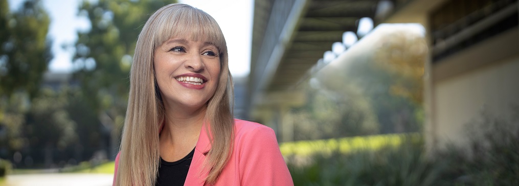 A woman smiling