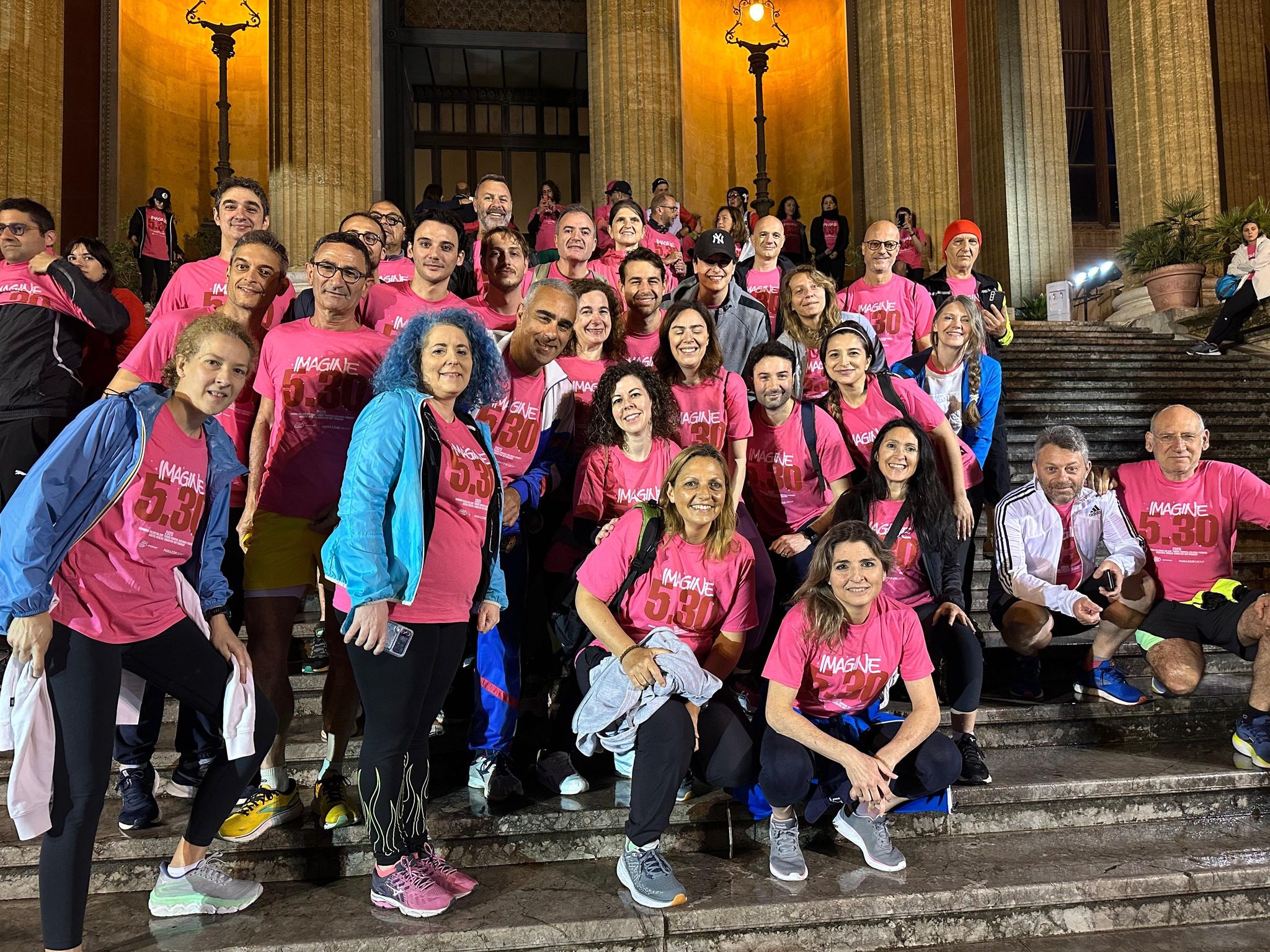 Group stands outside after a charity walk.