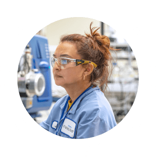 A Charles River Labs scientist working in a laboratory setting.