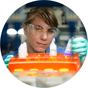 A female Charles River laboratory professional working with laboratory samples