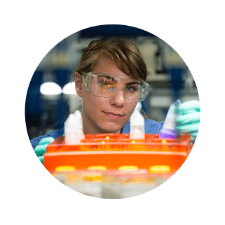 A female Charles River laboratory professional working with laboratory samples