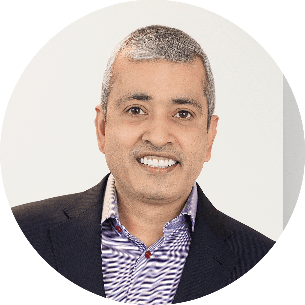 Nitin Tandon looking at the camera, in a professional headshot. 