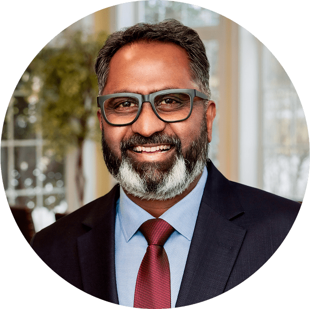 Venkatesh Natarajan looking at the camera, in a professional headshot. 