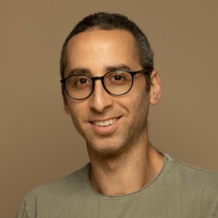 Headshot of a Remitly team member talking about how they embody the company’s cultural values.