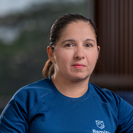 Headshot of a Remitly team member talking about how they embody the company’s cultural values.