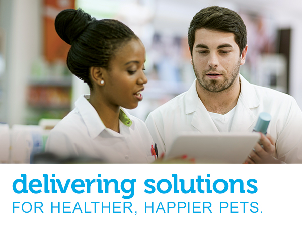 A male and a female Pharmacist confer over a clipboard and medications to find the correct prescription. Text across the image reads, “delivering solutions for healthier, happier pets.”