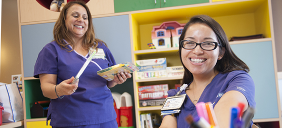 Two children's nurses in a playroom