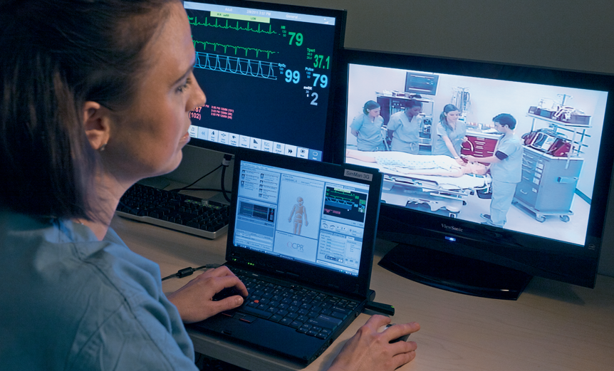 Member of the research team watching a procedure.