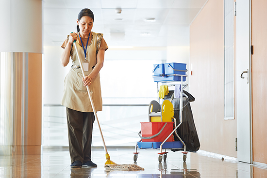 maid is cleaning the floor