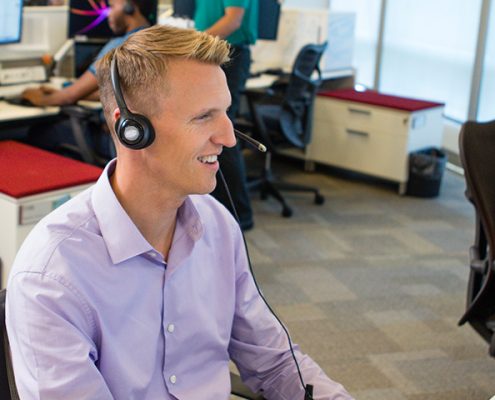 Vanguard financial advisor at work at computer
