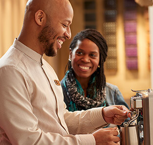 People Smiling Making Espresso