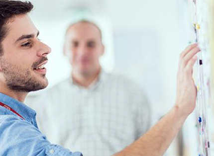 ADP associate gazing at a presentation board