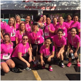 group of ADP women in pink T-shirts