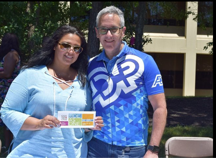 two ADP associates participating in Ride as One cycling event
