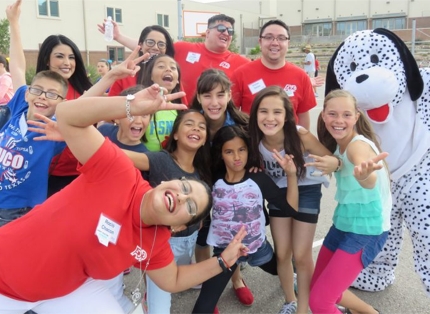 group of kids with ADP associates