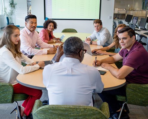 Team working around table